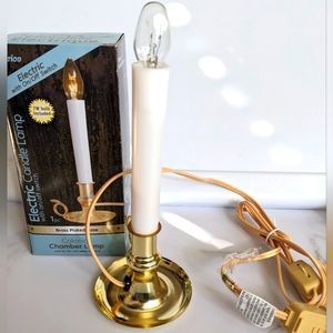 Electric brass plated base candle lamp